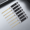Seven black-handle RC hex drivers with gold-colour tips, shown in an angled arrangement