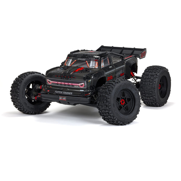 Official manufacturer reference image: ARRMA Outcast 1/5 EXB 8S RTR in black; actual sealed box shown separately