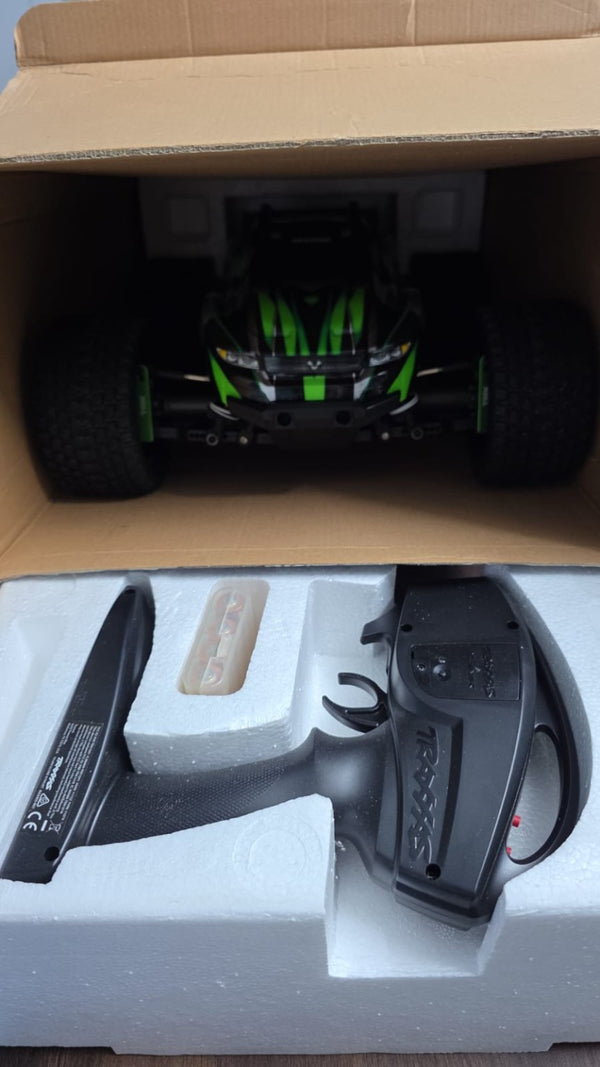 Seller-supplied photo of Traxxas Rustler Ultimate and transmitter in original packaging