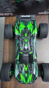 Seller-supplied overhead photo of green Traxxas Rustler Ultimate with body installed