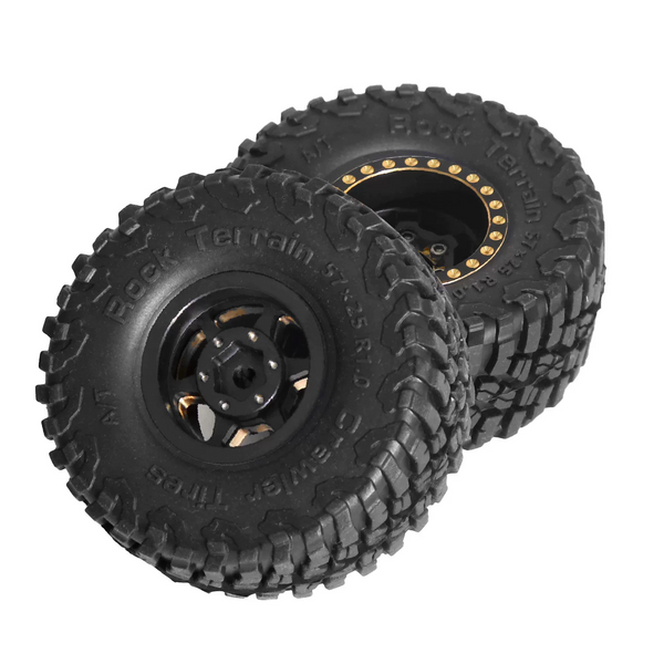 Front and rear of Design A brass beadlock wheel with Tread B crawler tyre